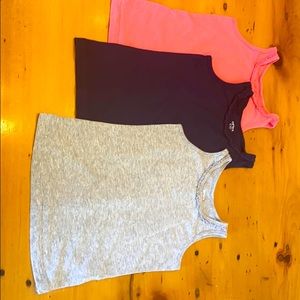 Carter’s ruffle edge tank tops